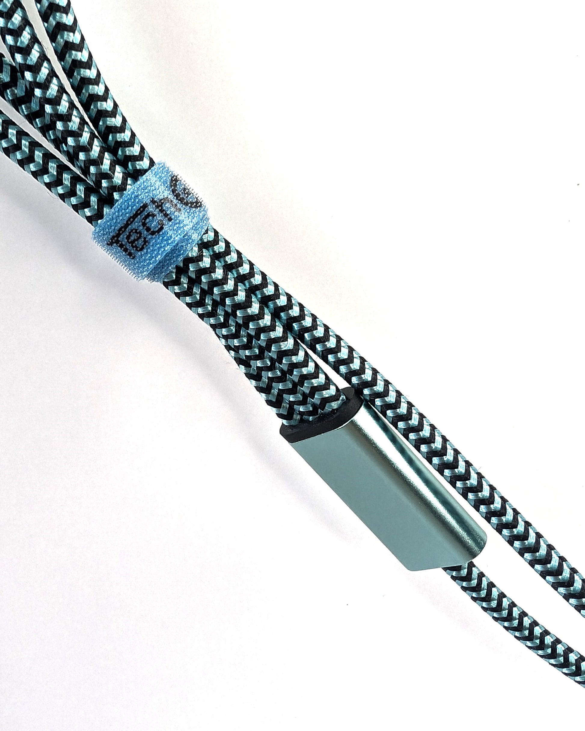 Close up of braided cord and strap of 10ft all in one charger with type c and micro usb connectors